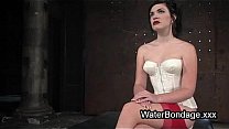 Gagged brunette gets water bondage